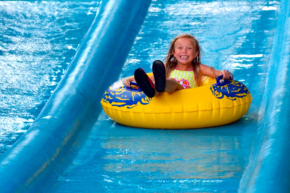 Child On Tube Slide - Thrill Hill